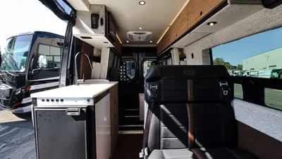 2027 Storyteller Overland Darkmode photo 3